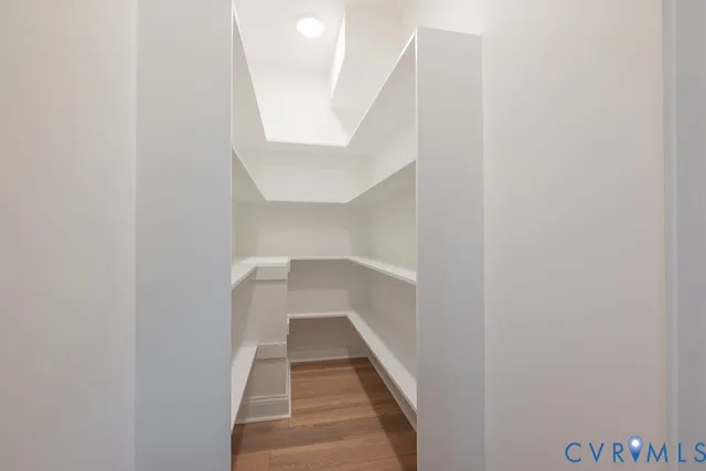 a view of a balcony with wooden floor