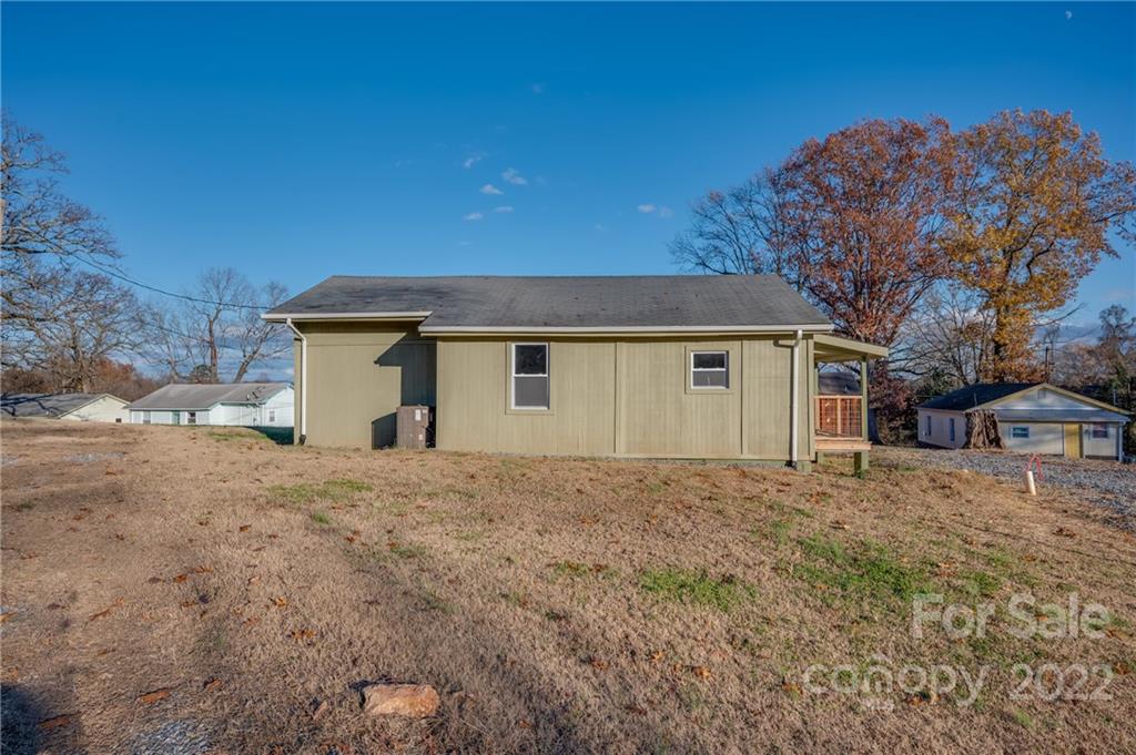 147 North Ridgecrest Avenue Rutherfordton, NC 28139 - Photo 17 of 21 a house with trees in front of it