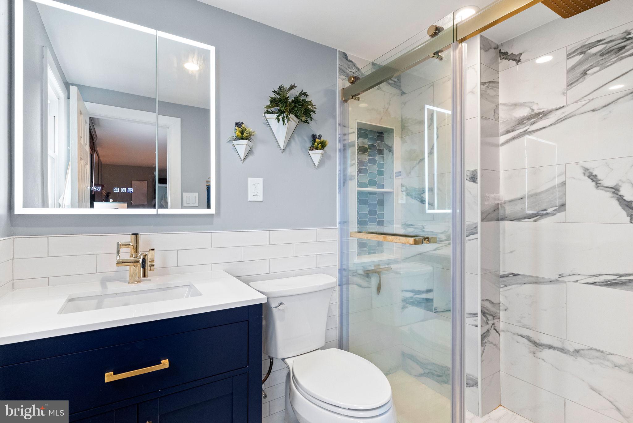 3201 Fairway Road Bensalem, PA 19020 - Photo 54 of 54 a bathroom with a sink a toilet and shower