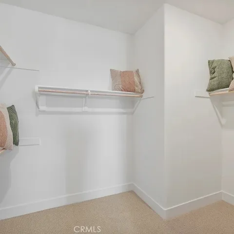 a view of a room with racks on the wall