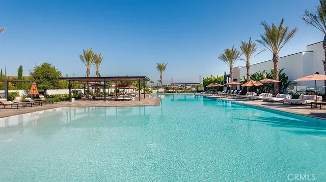 a view of a porch with furniture and garden