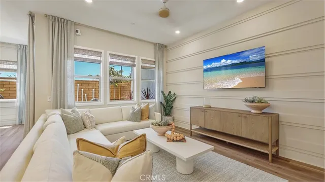 a living room with furniture and window