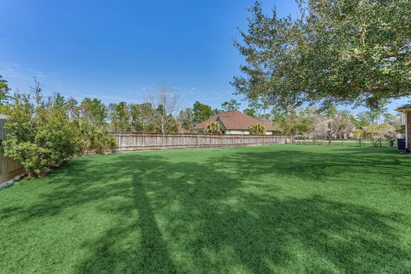 a view of a house with a big yard