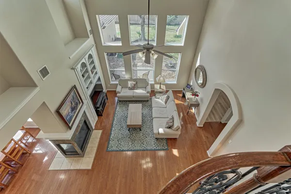 a view of living room with furniture and a chandelier