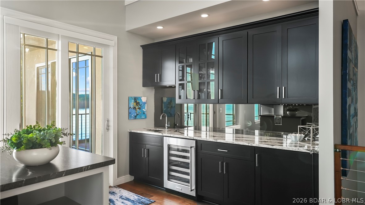 777 Malibu Road Osage Beach, MO 65065 - Photo 27 of 100 A stylish main level wet bar creates the perfect s