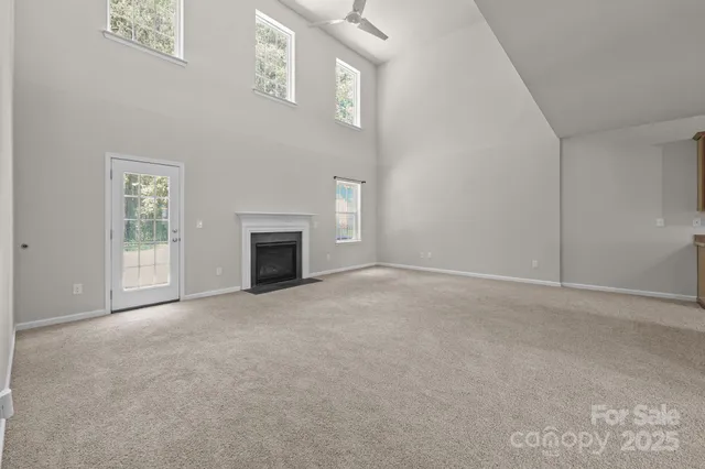 a kitchen with stainless steel appliances granite countertop a refrigerator stove and sink