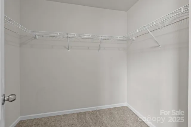 a view of a livingroom with a staircase