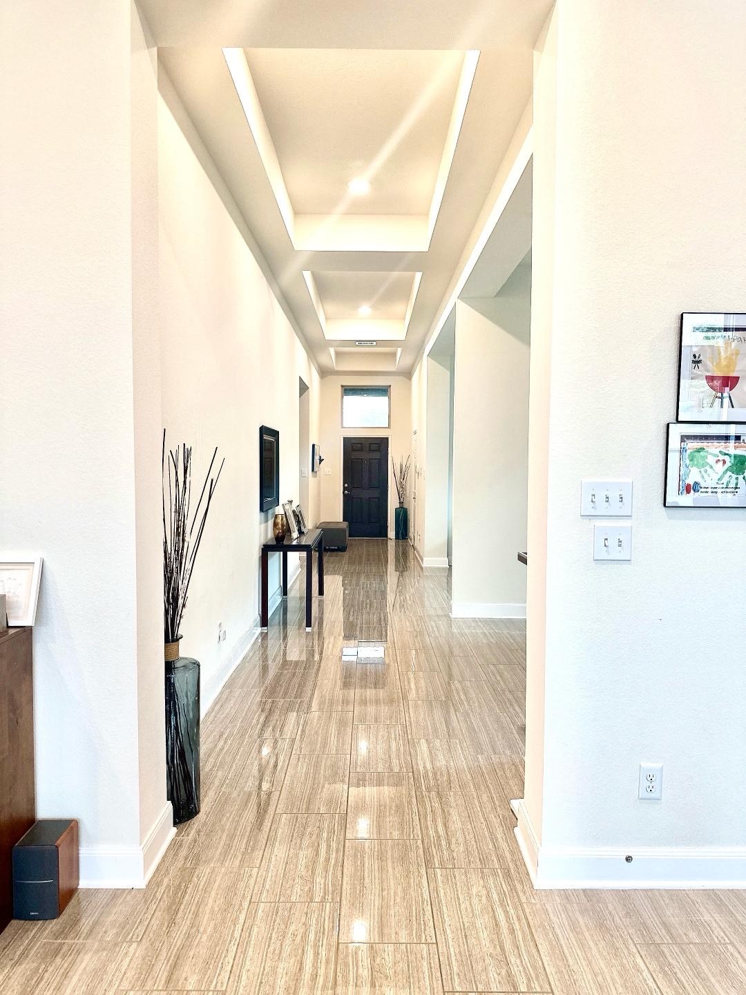 1110 Penny Ranch Lane Katy, TX 77494 - Photo 6 of 31 a view of a living room with a wooden floor