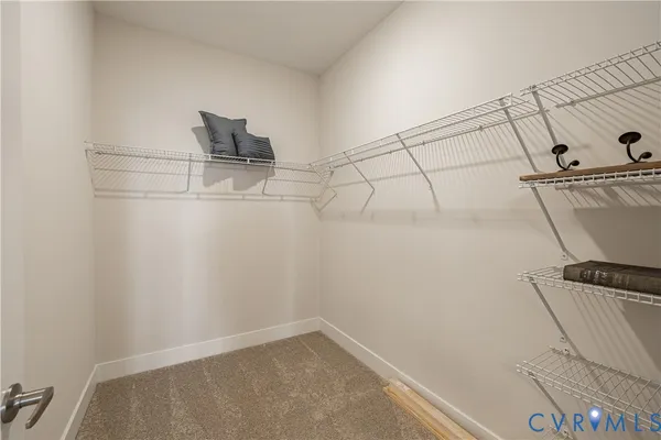 a view of a room with racks on the wall