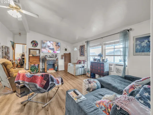 a living room with furniture and a couch