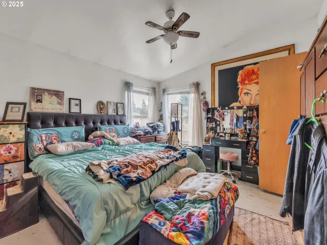 a living room with lots of furniture and a flat screen tv