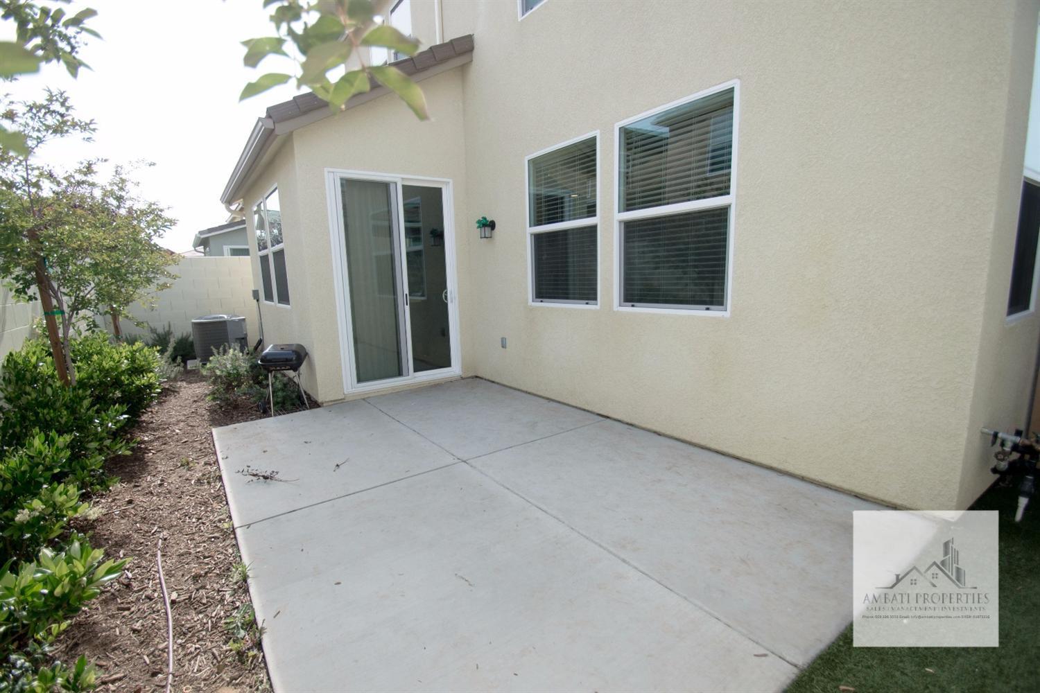 3539 Luminary Way Clovis, CA 93619 - Photo 13 of 13 a view of backyard with potted plants