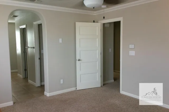 a kitchen that has a sink and a stove