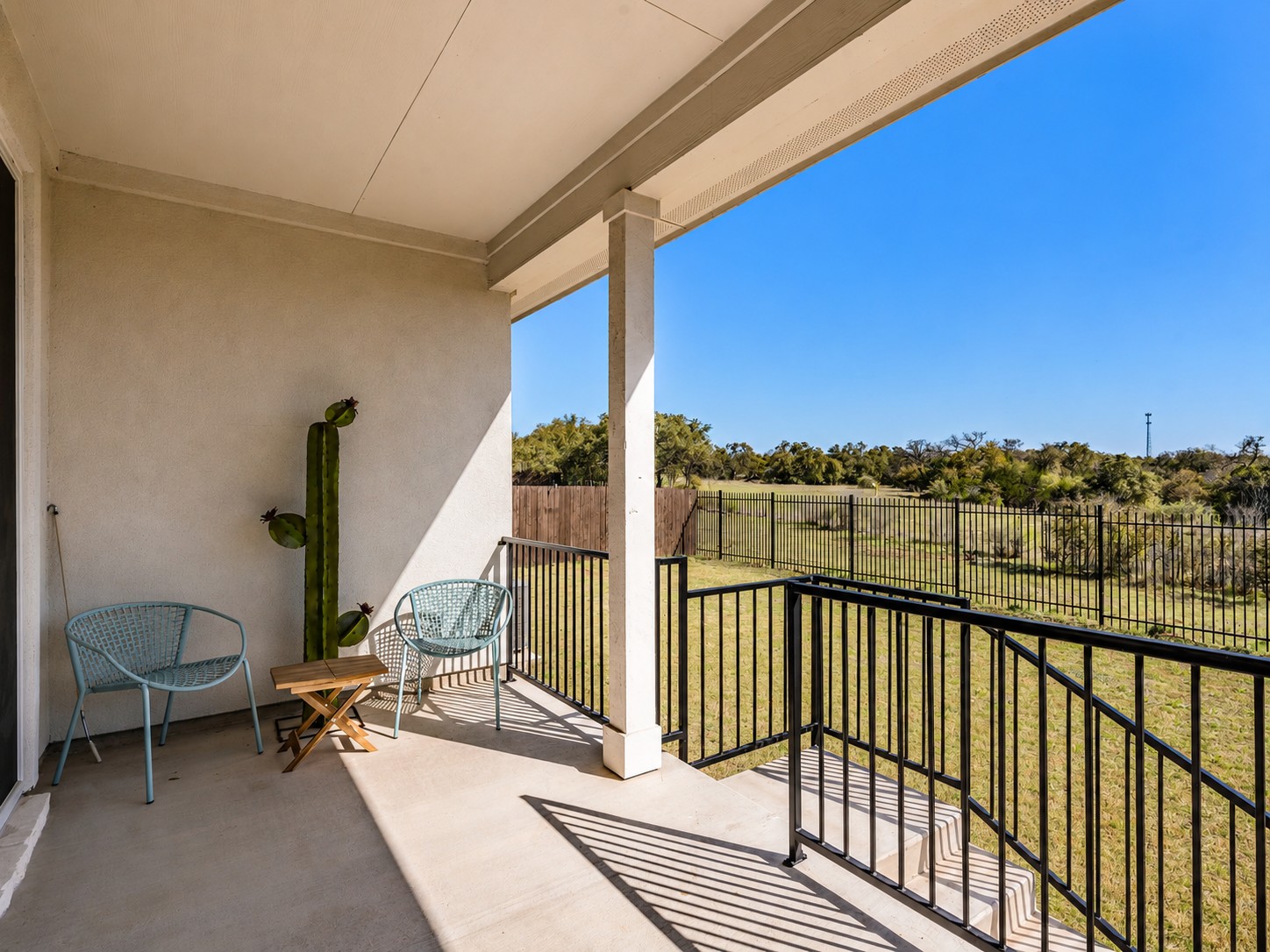 2132 Centerline Lane Georgetown, TX 78628 - Photo 26 of 30 Extended covered back patio enough room for dining table and seating area with shade screen