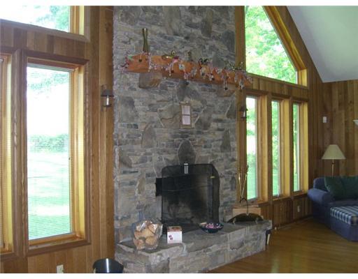 775 Back Creek Road Champion, PA 15622 - Photo 6 of 18 Other. Wood Buring fireplace with fan.