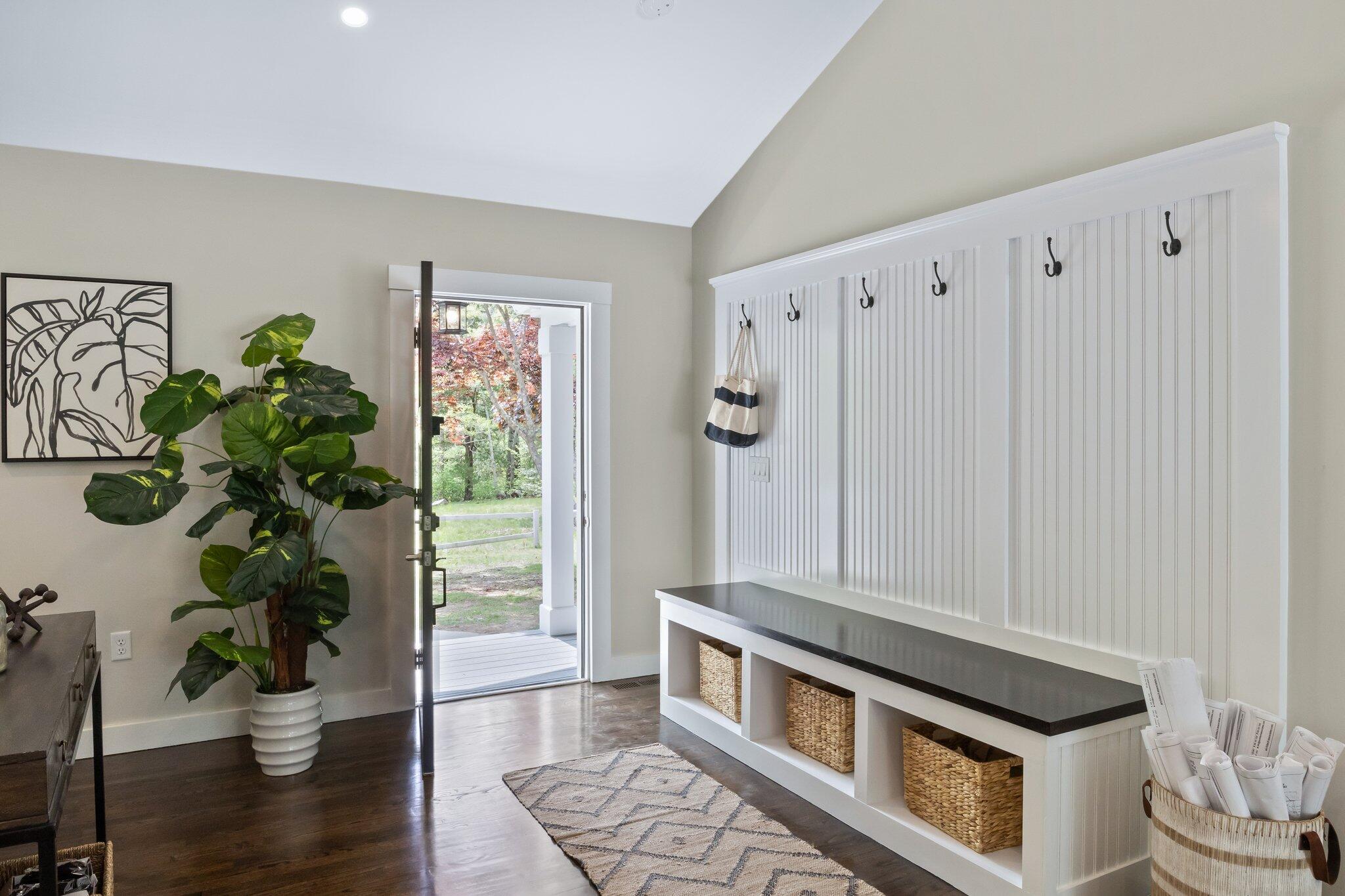 169 Old Post Road Centerville, MA 02632 - Photo 13 of 53 a living room with furniture and a potted plant
