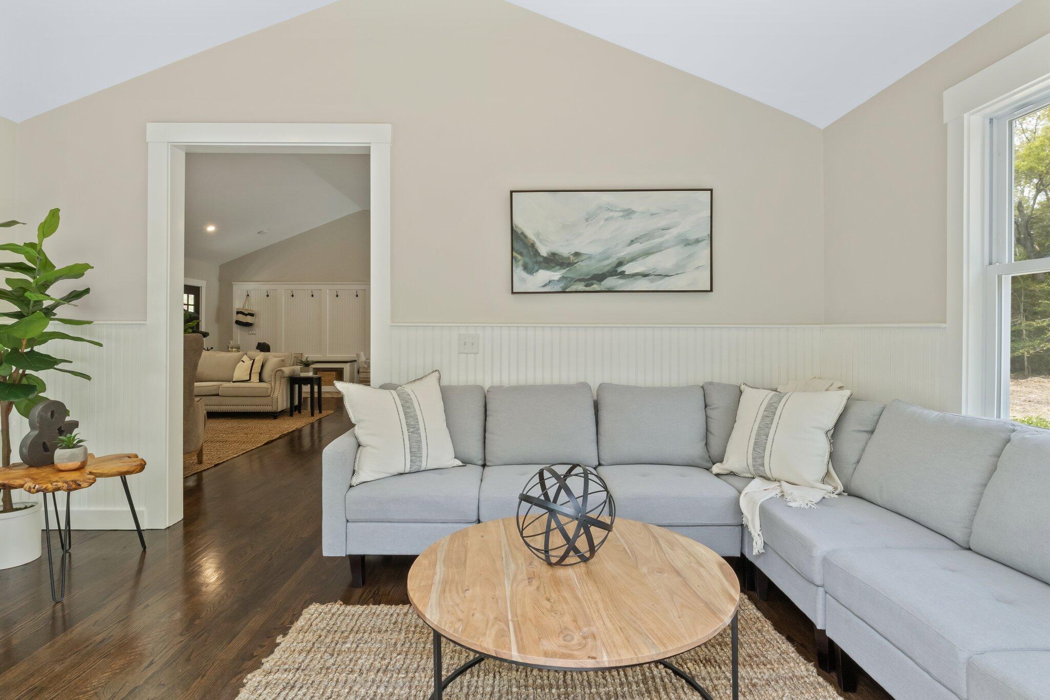 169 Old Post Road Centerville, MA 02632 - Photo 24 of 53 a living room with furniture and wooden floor