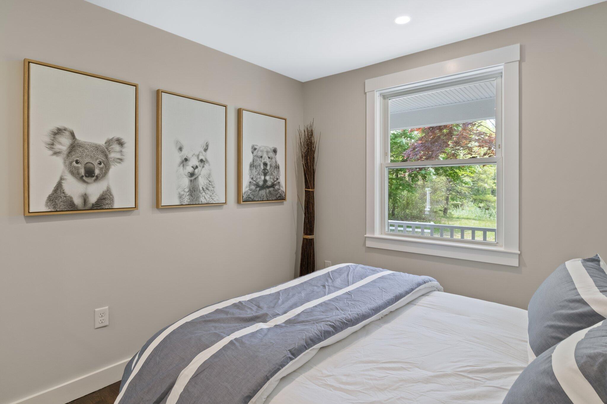 169 Old Post Road Centerville, MA 02632 - Photo 26 of 53 a bedroom with a bed and a window