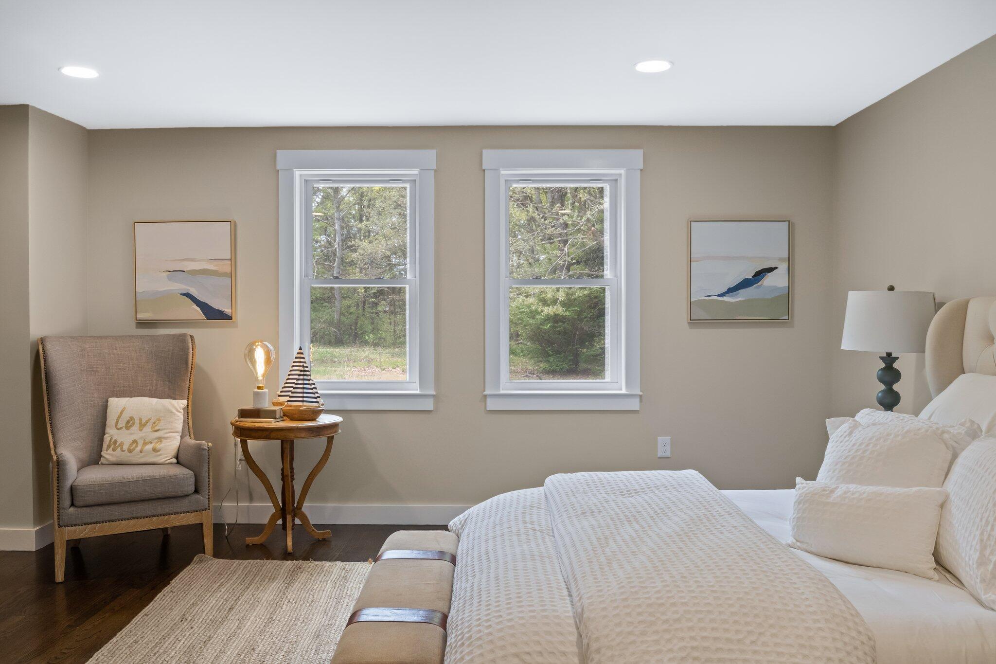 169 Old Post Road Centerville, MA 02632 - Photo 32 of 53 a bedroom with a bed and wooden floor