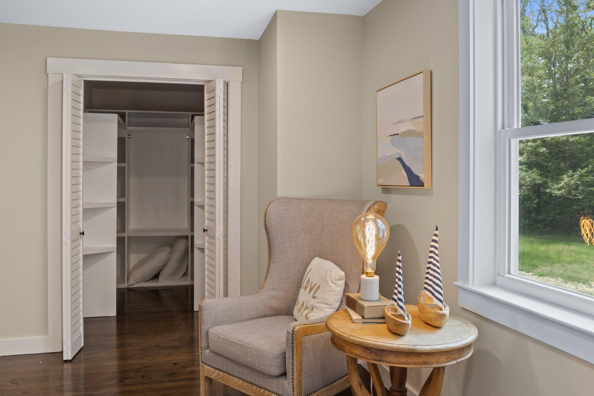 169 Old Post Road Centerville, MA 02632 - Photo 33 of 53 a living room with furniture and a window