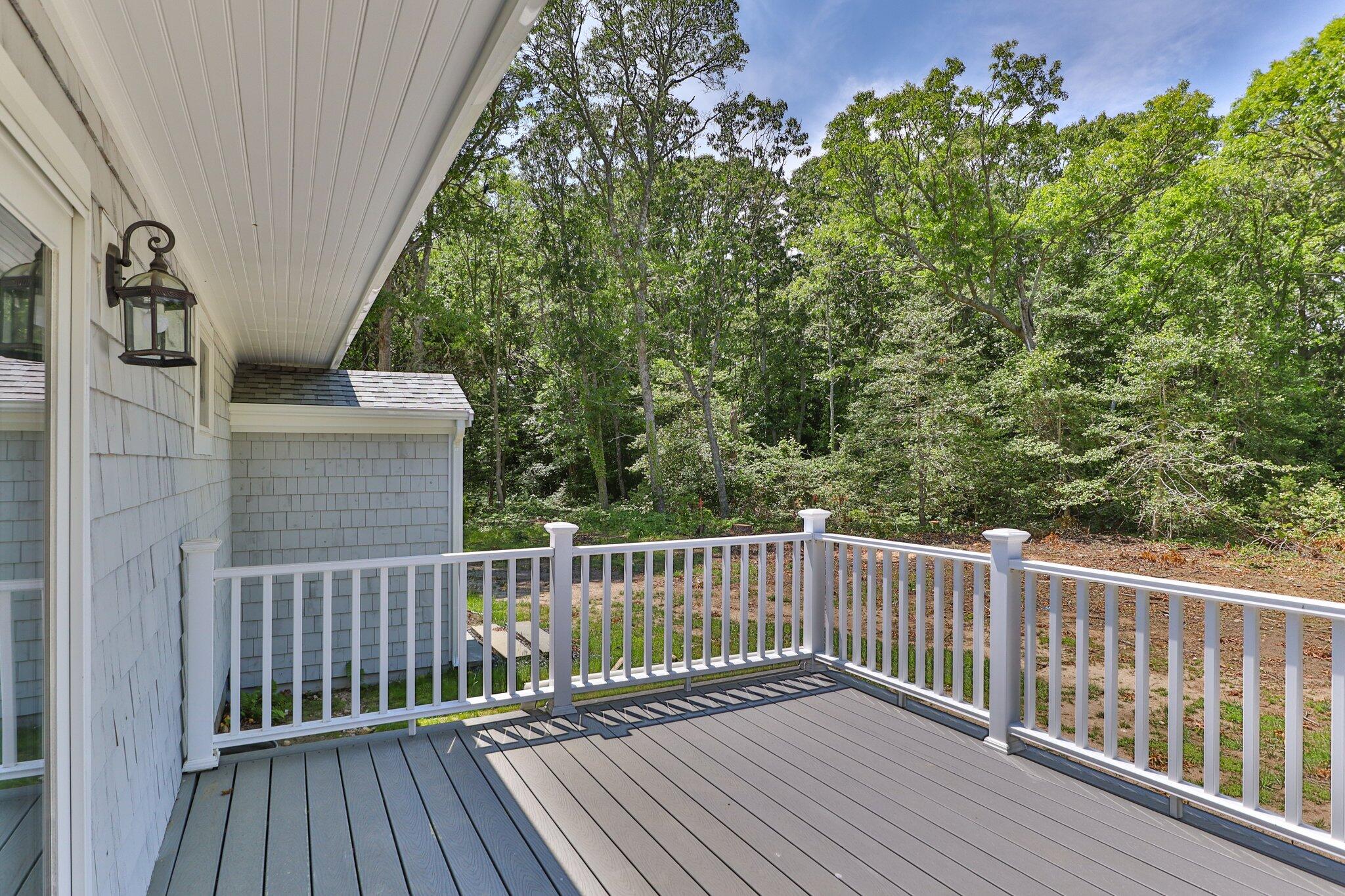 169 Old Post Road Centerville, MA 02632 - Photo 38 of 53 a view of deck with wooden floor and fence