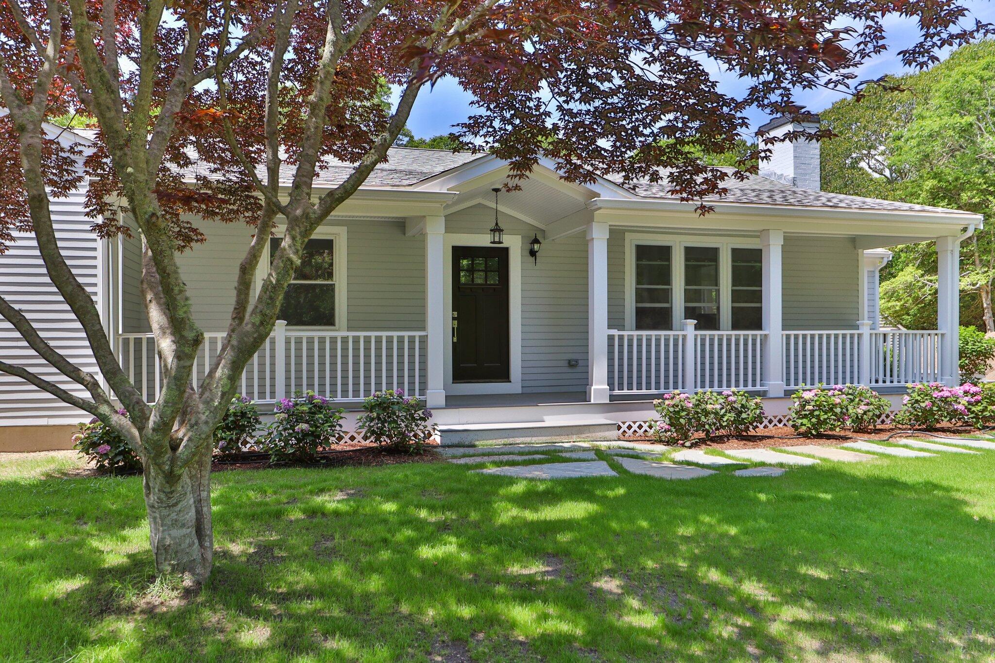 169 Old Post Road Centerville, MA 02632 - Photo 47 of 53 a view of a house with a yard