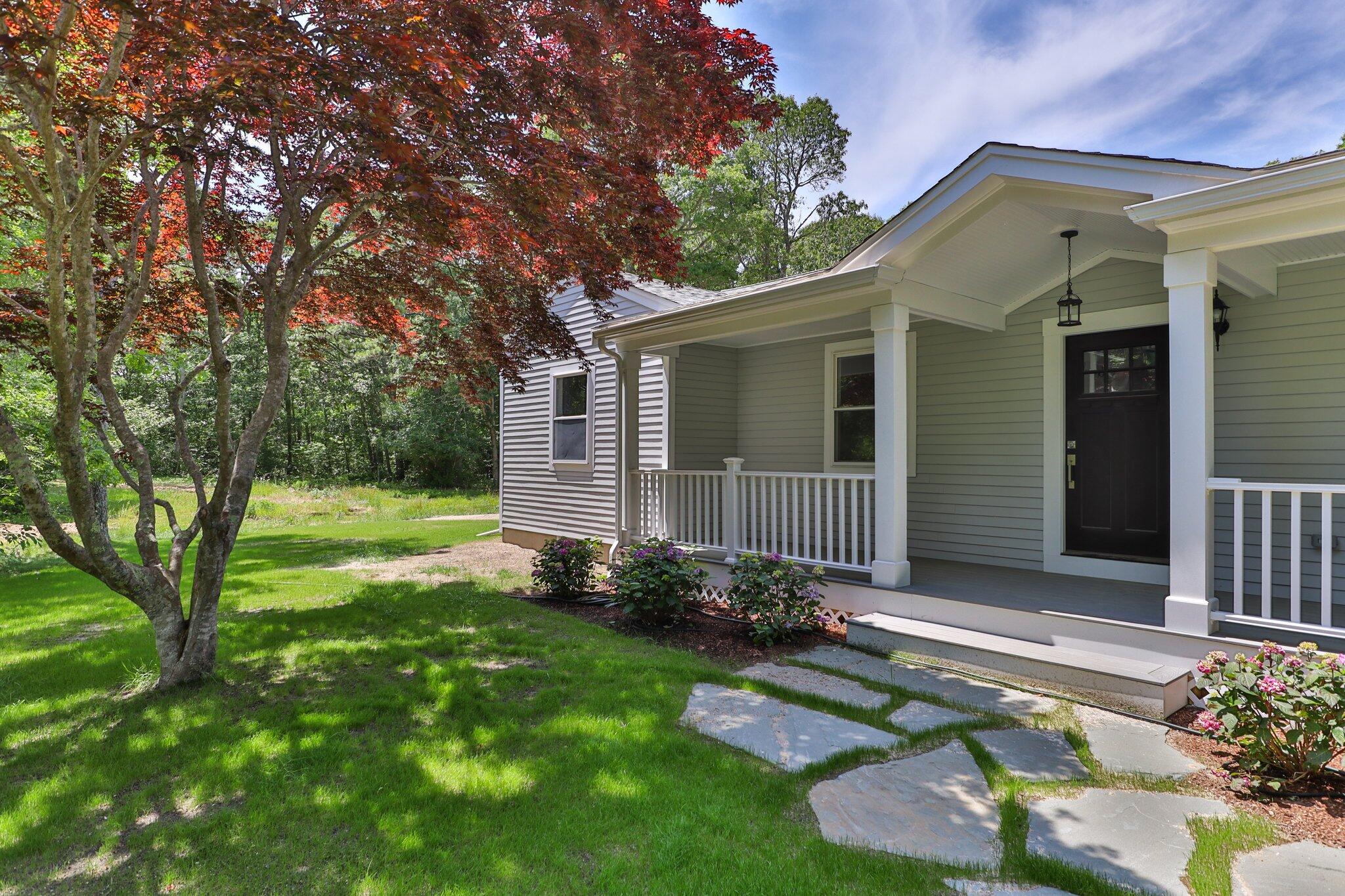 169 Old Post Road Centerville, MA 02632 - Photo 48 of 53 a front view of a house with garden