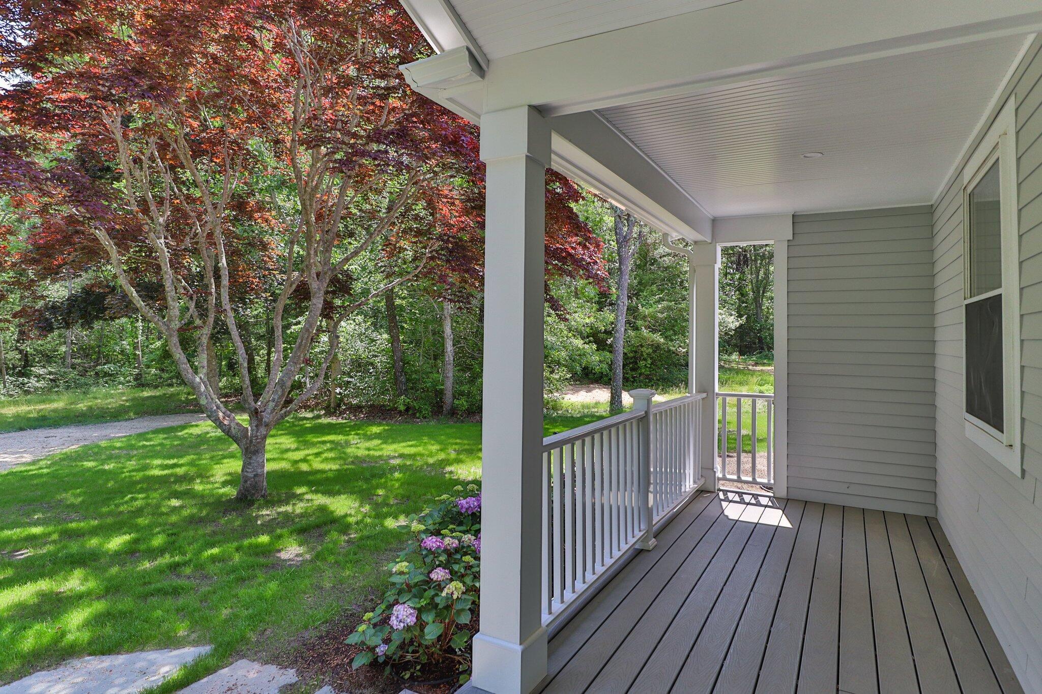169 Old Post Road Centerville, MA 02632 - Photo 49 of 53 a view of a porch with wooden floor and outdoor space
