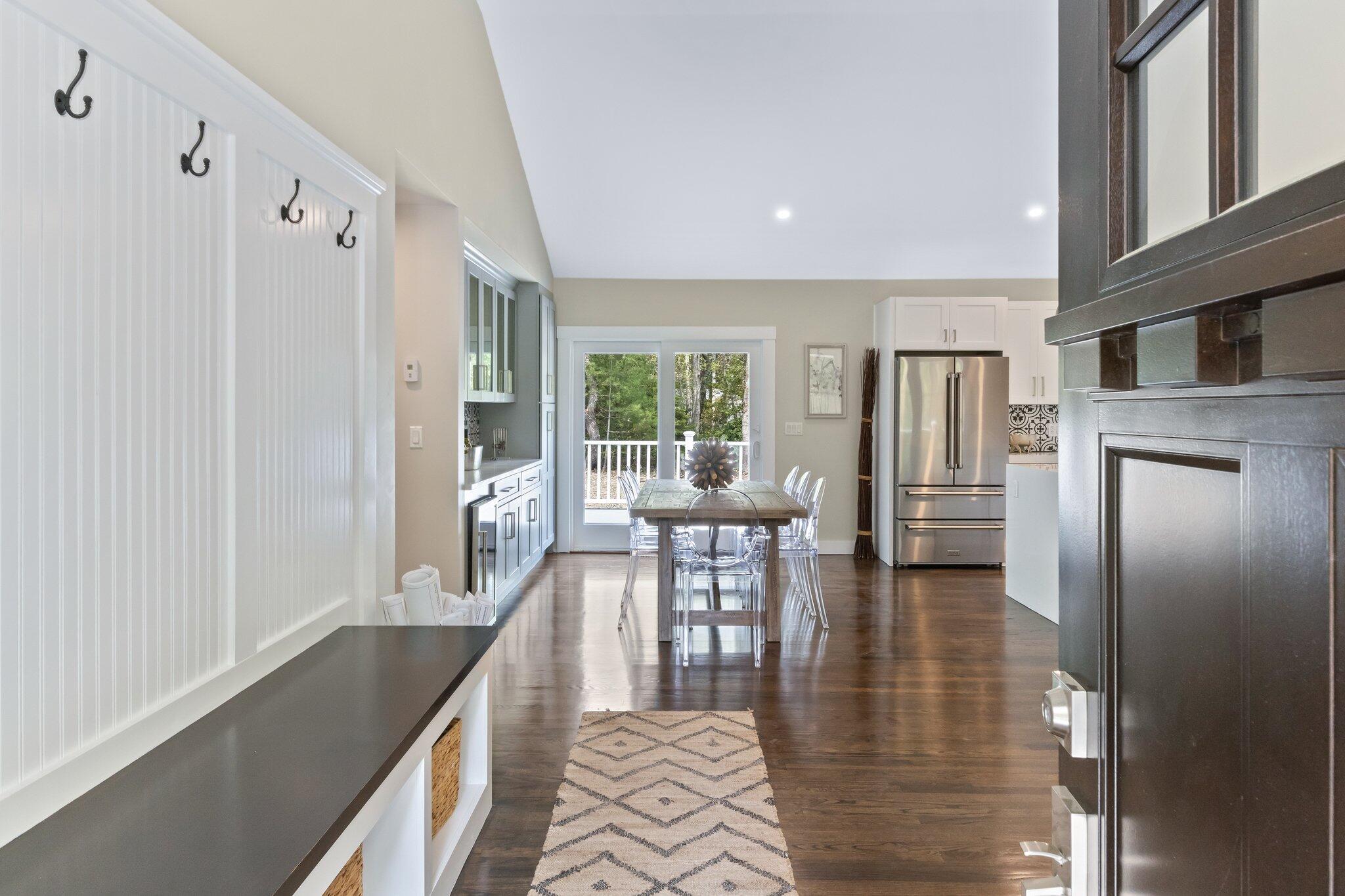 169 Old Post Road Centerville, MA 02632 - Photo 6 of 53 a living room with furniture and a kitchen