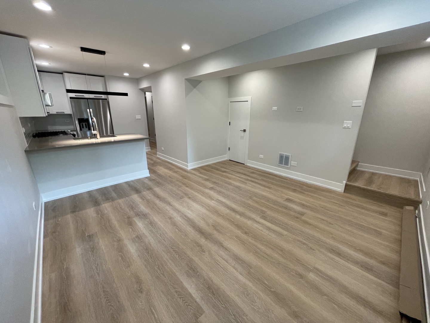 Undisclosed Address Chicago, IL 60622 - Photo 2 of 13 a view of kitchen with refrigerator and cabinets
