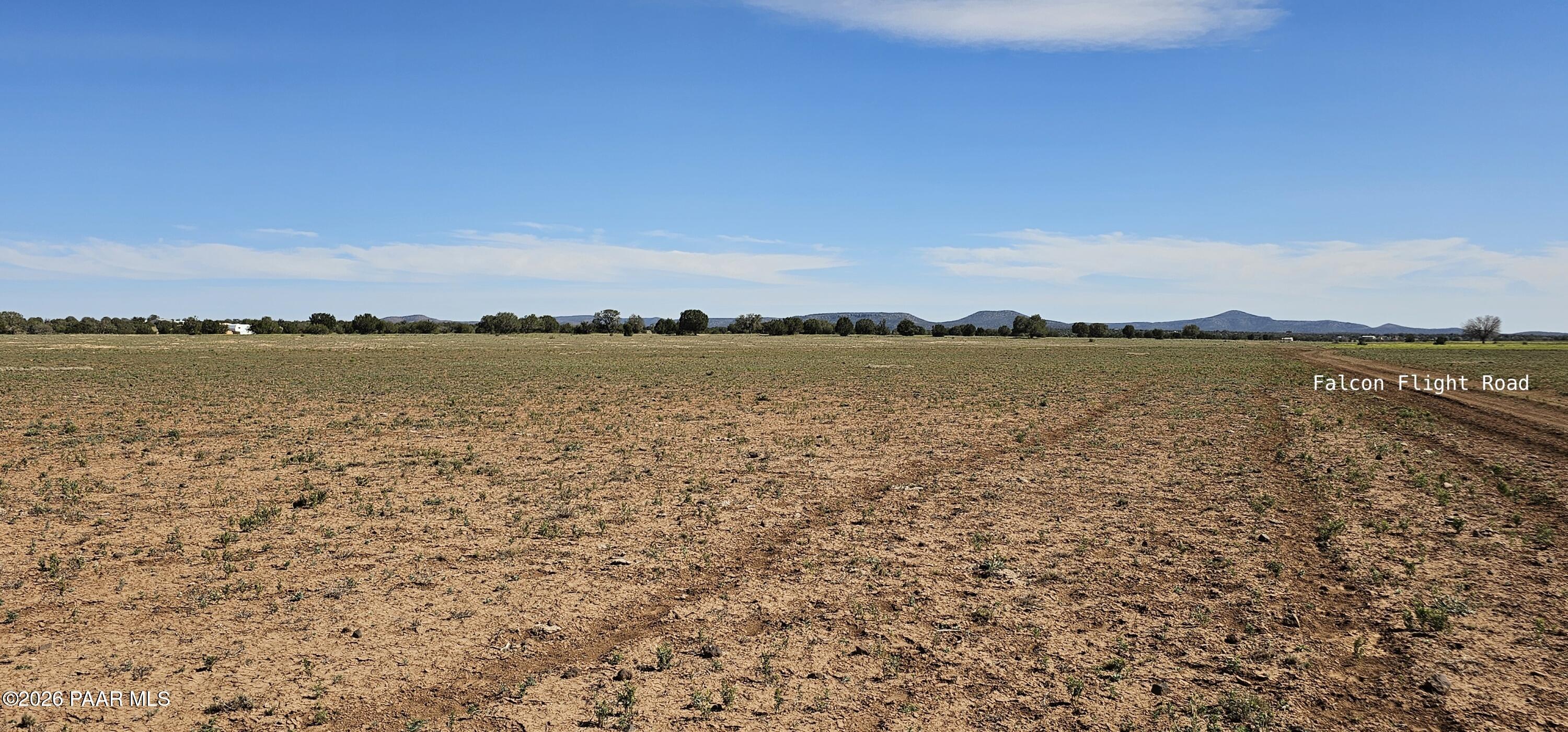 Lot 252-nw Falcon Flight Road Ash Fork, AZ 86320 - Photo 3 of 4 a view of an ocean beach and city