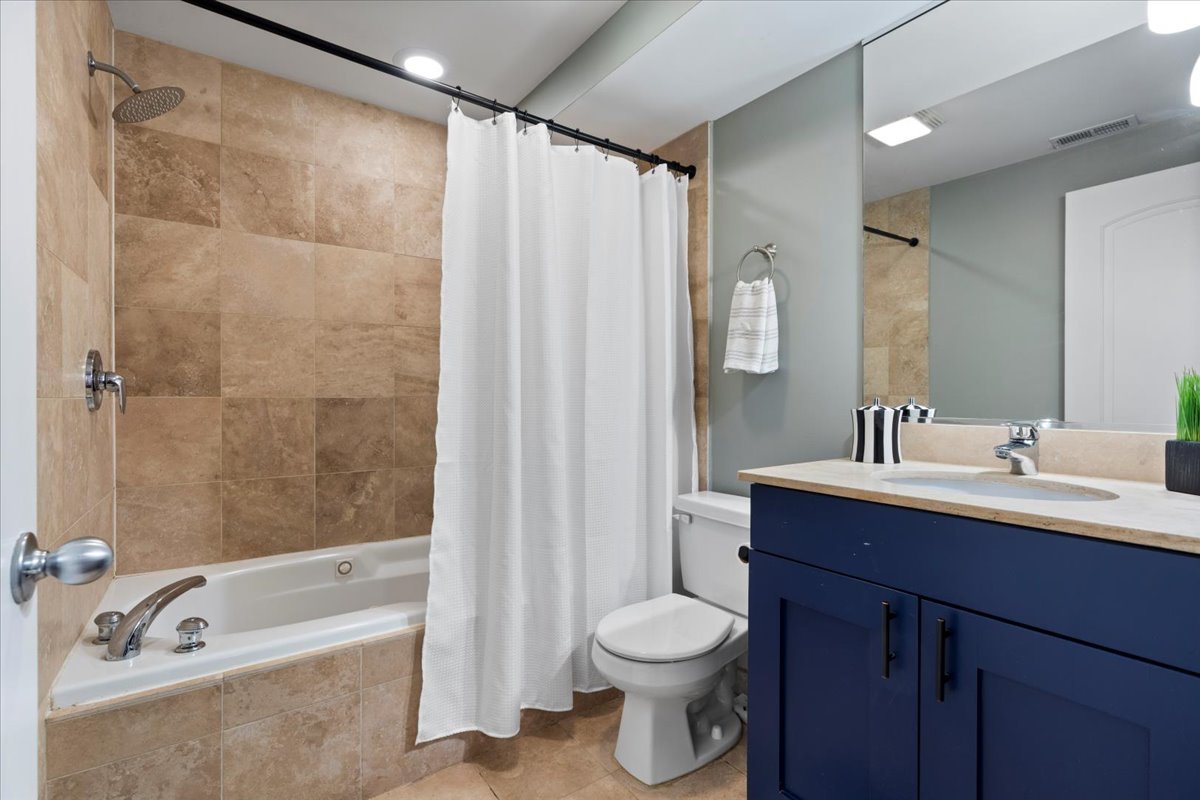 514 North Armour Street, Unit 1F Chicago, IL 60642 - Photo 18 of 18 a bathroom with a sink a toilet and shower