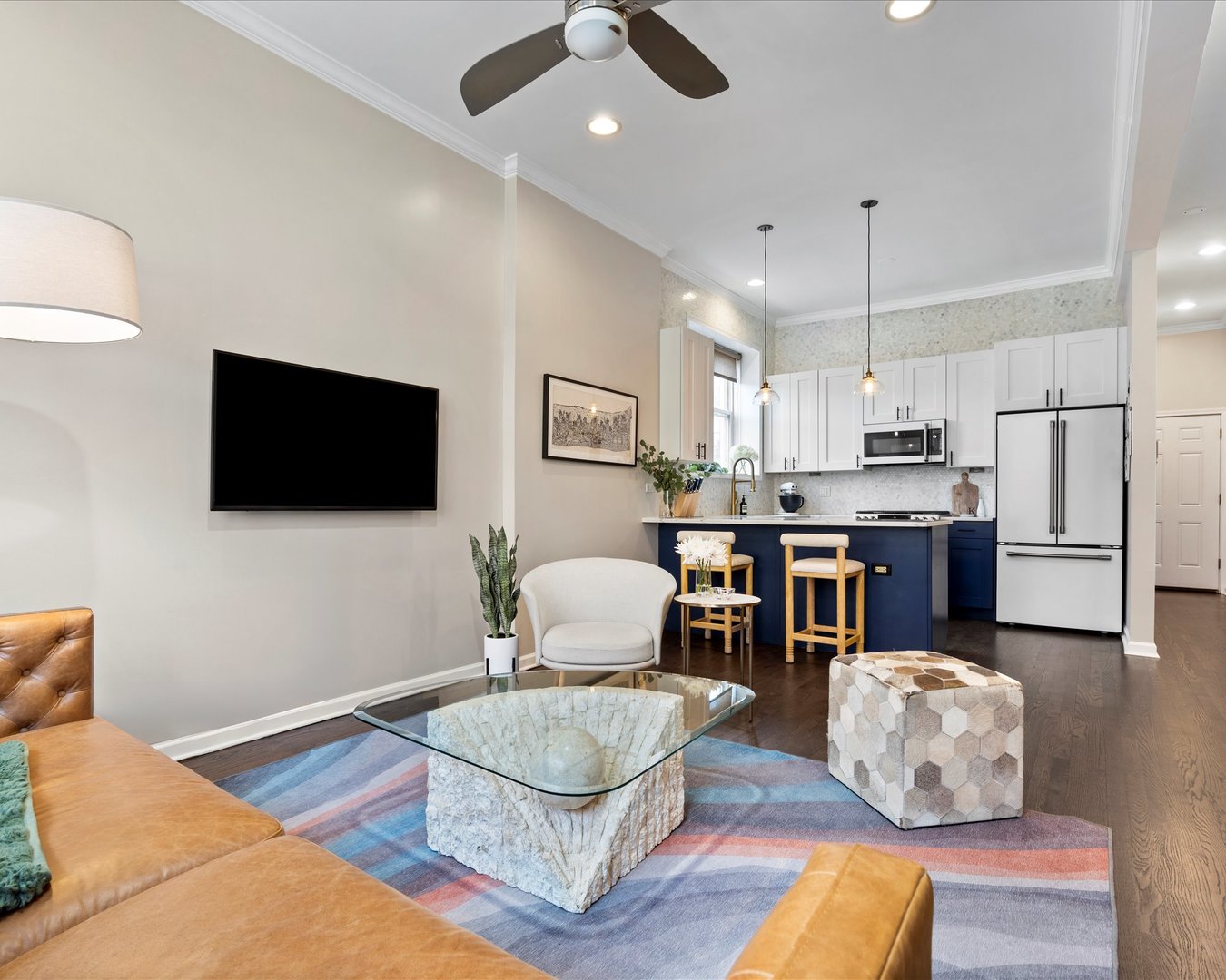 514 North Armour Street, Unit 1F Chicago, IL 60642 - Photo 4 of 18 a living room with furniture and a flat screen tv