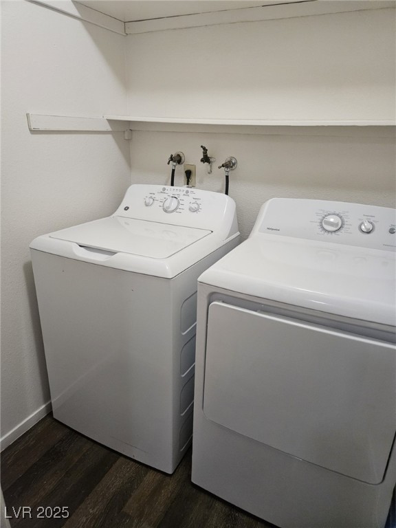 5576 West Rochelle Avenue, Unit 31A Las Vegas, NV 89103 - Photo 11 of 11 Laundry area with washer and dryer and dark wood-type flooring