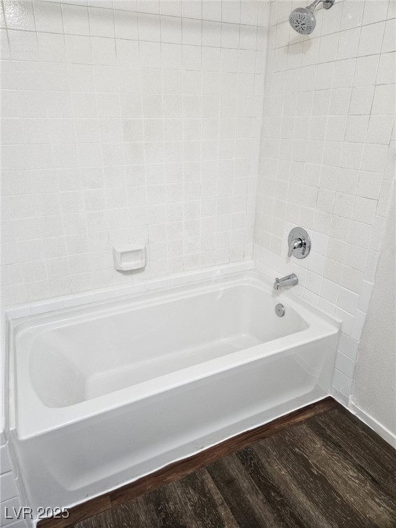 5576 West Rochelle Avenue, Unit 31A Las Vegas, NV 89103 - Photo 9 of 11 Bathroom with wood finished floors and bathtub / shower combination