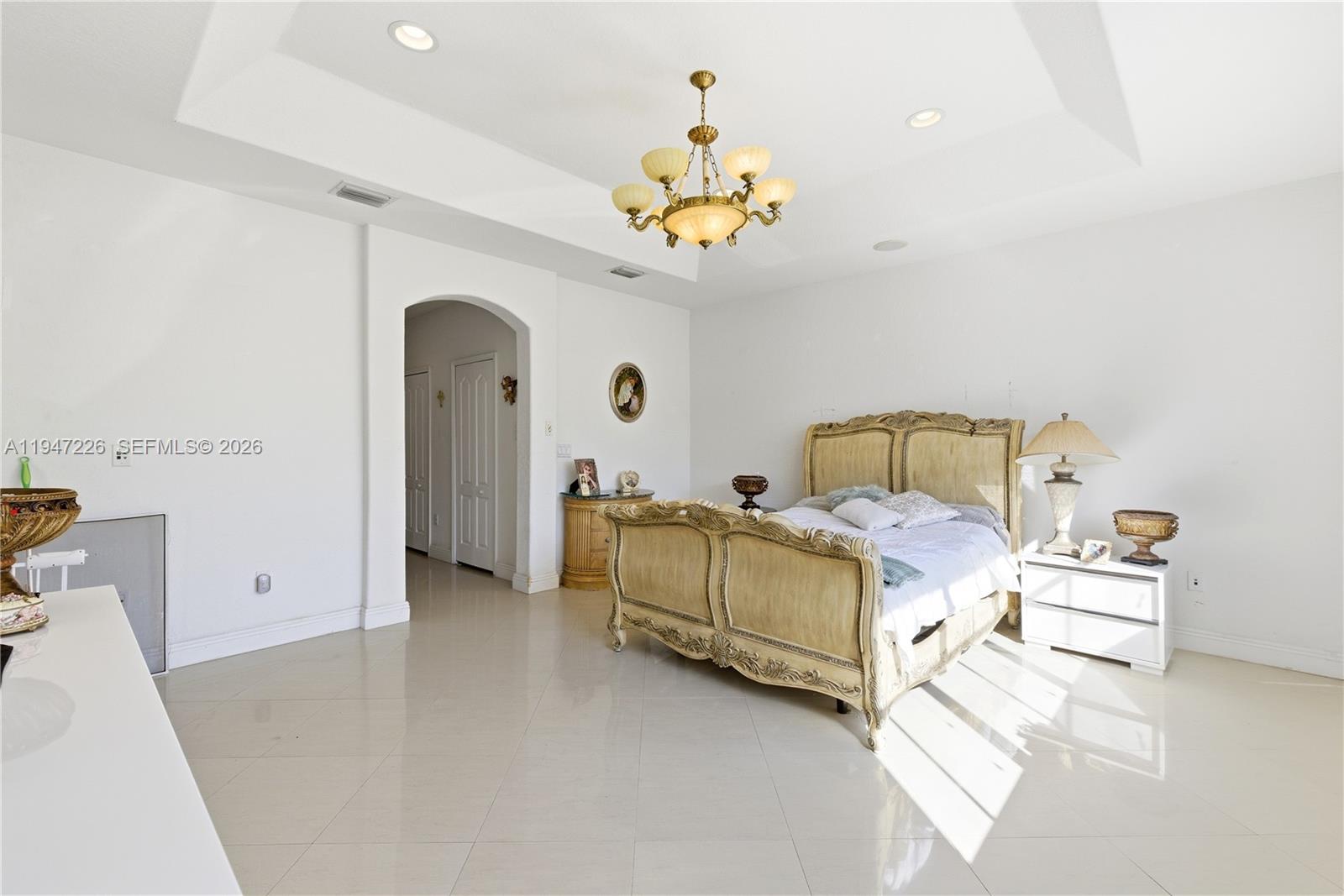 15184 Southwest 20th Street Miami, FL 33185 - Photo 21 of 56 a bedroom with bed and window