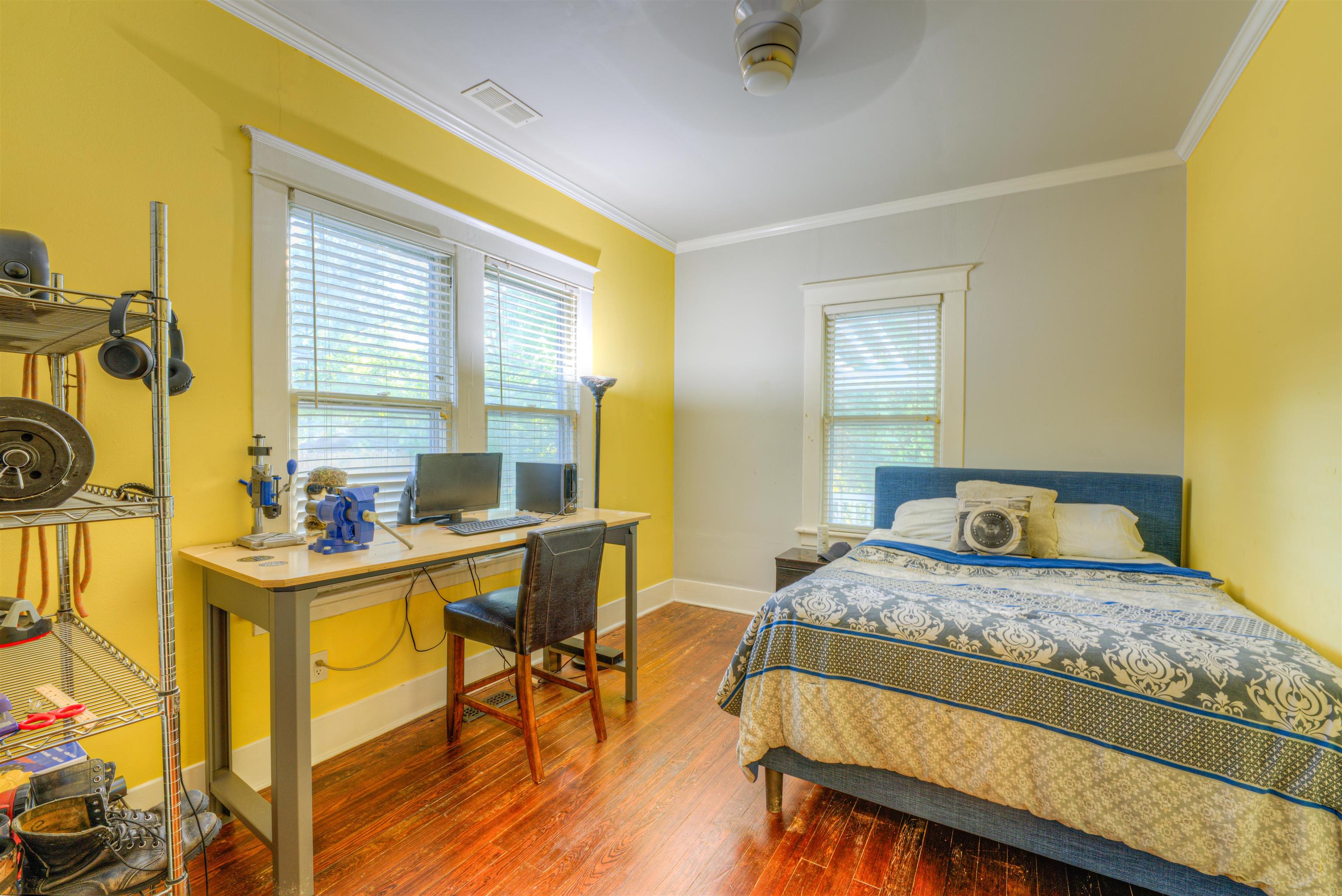 511 Ellsworth Street Memphis, TN 38111 - Photo 17 of 29 a bedroom with a bed and a table