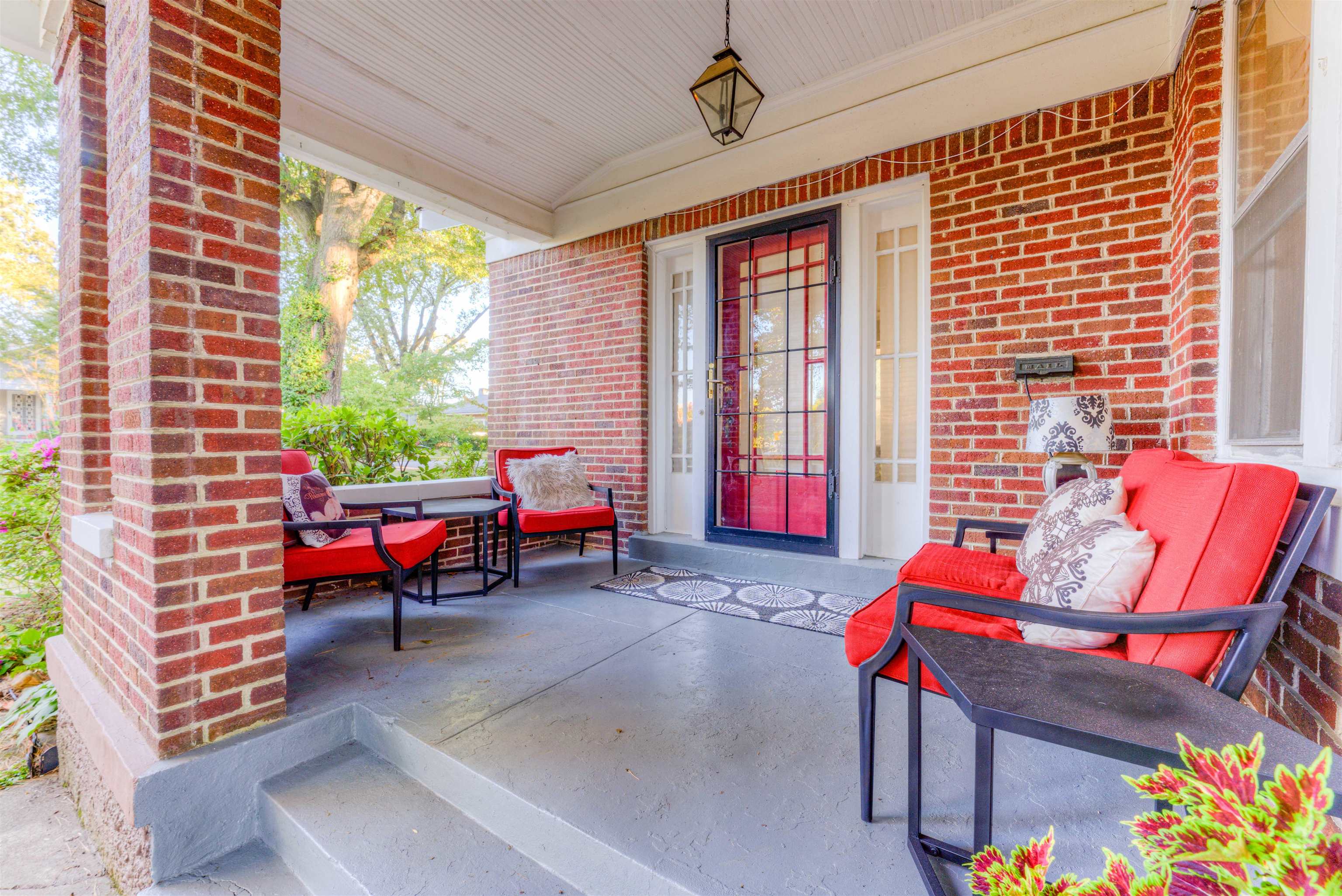 511 Ellsworth Street Memphis, TN 38111 - Photo 2 of 29 a outdoor living space with furniture and a potted plant