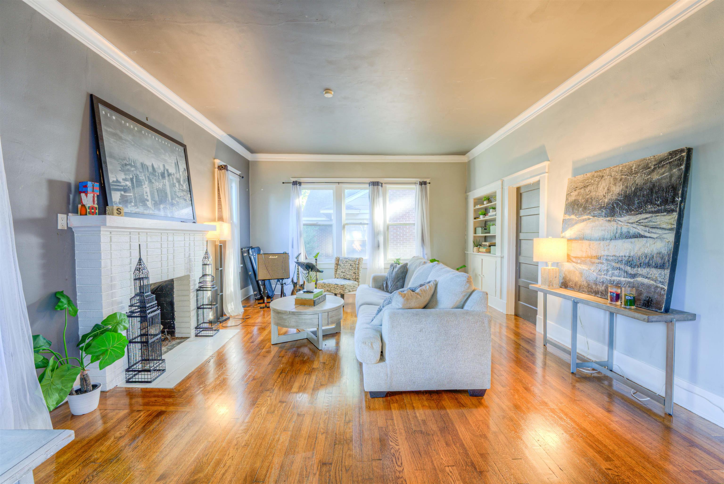 511 Ellsworth Street Memphis, TN 38111 - Photo 4 of 29 a living room with furniture and a fireplace