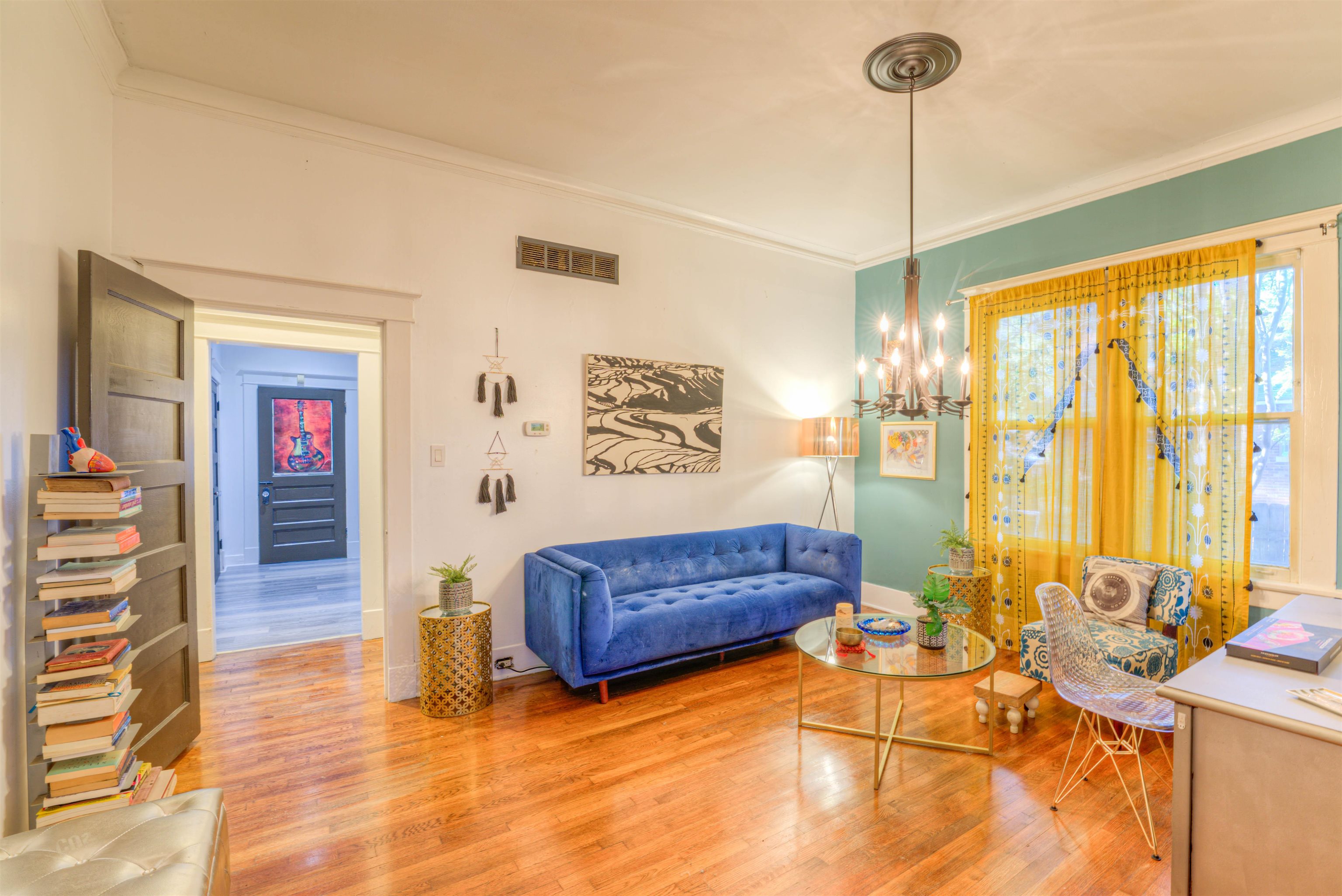 511 Ellsworth Street Memphis, TN 38111 - Photo 9 of 29 a living room with furniture and a chandelier