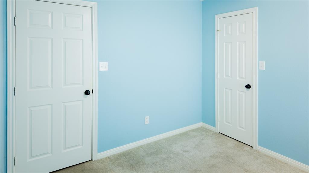 124 Topaz Circle Hewitt, TX 76643 - Photo 22 of 29 Unfurnished room featuring light carpet and baseboards