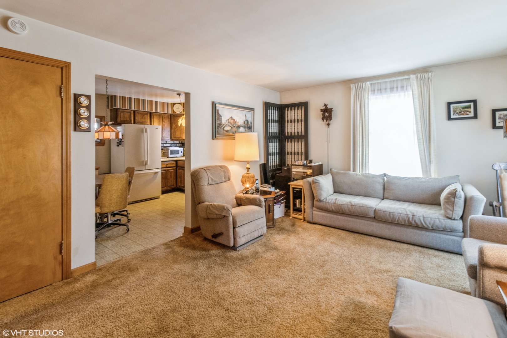 233 High Ridge Road Hillside, IL 60162 - Photo 2 of 10 a living room with furniture and a window