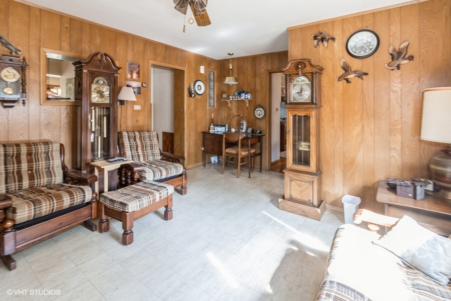 233 High Ridge Road Hillside, IL 60162 - Photo 9 of 10 a living room with furniture and a large window