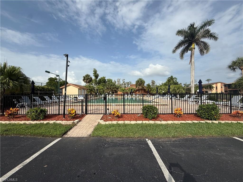 6492 Royal Woods Drive, Unit 5 Fort Myers, FL 33908 - Photo 23 of 28 a park with lots of swings and slides