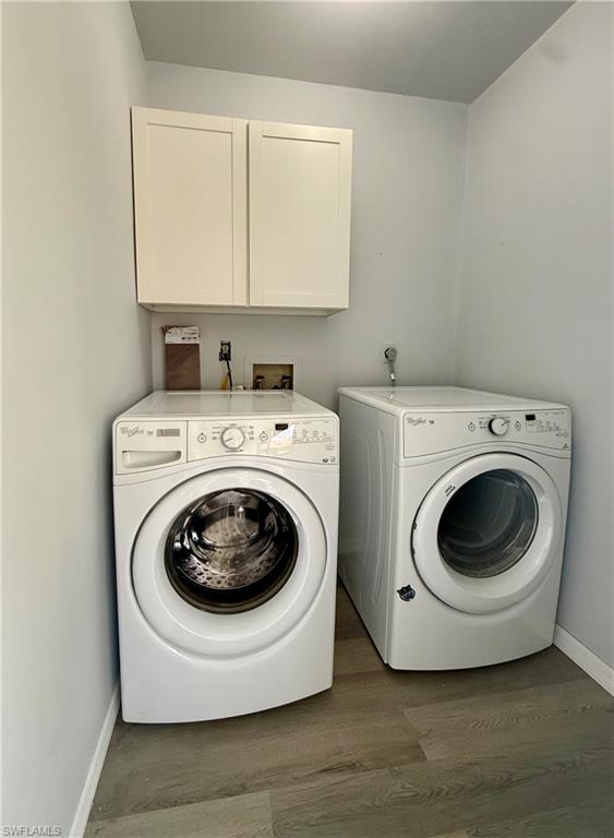 6492 Royal Woods Drive, Unit 5 Fort Myers, FL 33908 - Photo 10 of 28 a utility room with dryer and washer