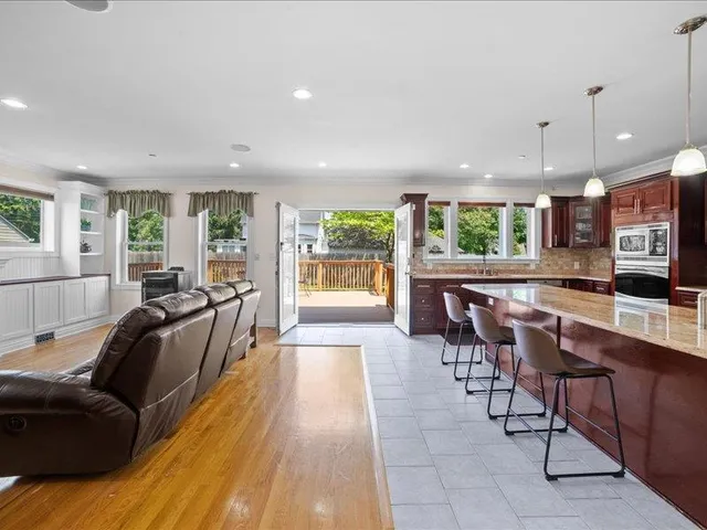 a view of a dining room with furniture window and outside view