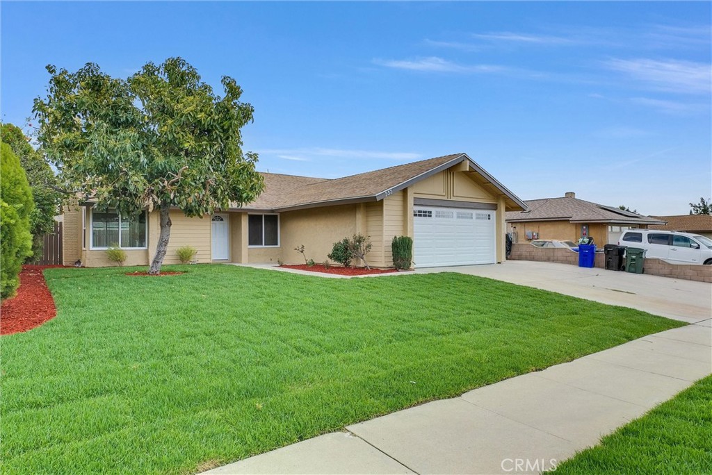 337 North Aspen Avenue Rialto, CA 92376 - Photo 1 of 1 a view of an house with backyard space and garden