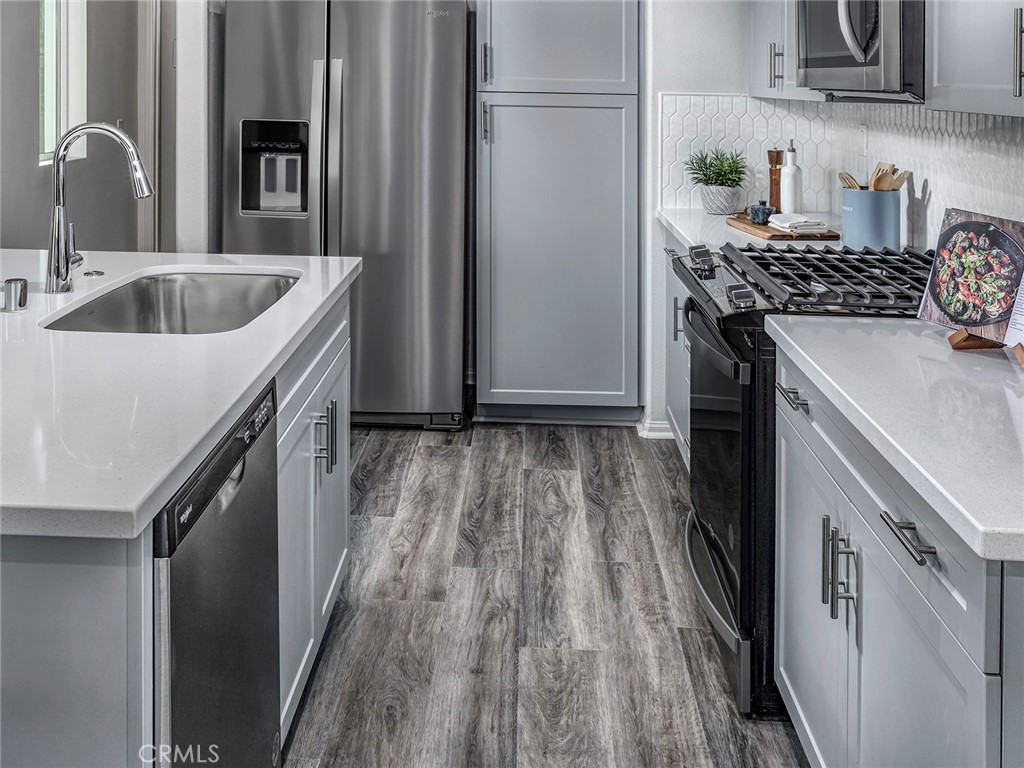 4723 Merida Way Oceanside, CA 92057 - Photo 6 of 13 Photo is not of the actual home, but is an inspirational photo of builder’s model home and may depict options, furnishings, and/or decorator features that are not included
