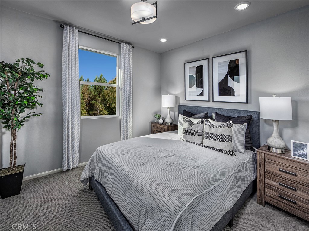4723 Merida Way Oceanside, CA 92057 - Photo 8 of 13 Photo is not of the actual home, but is an inspirational photo of builder’s model home and may depict options, furnishings, and/or decorator features that are not included