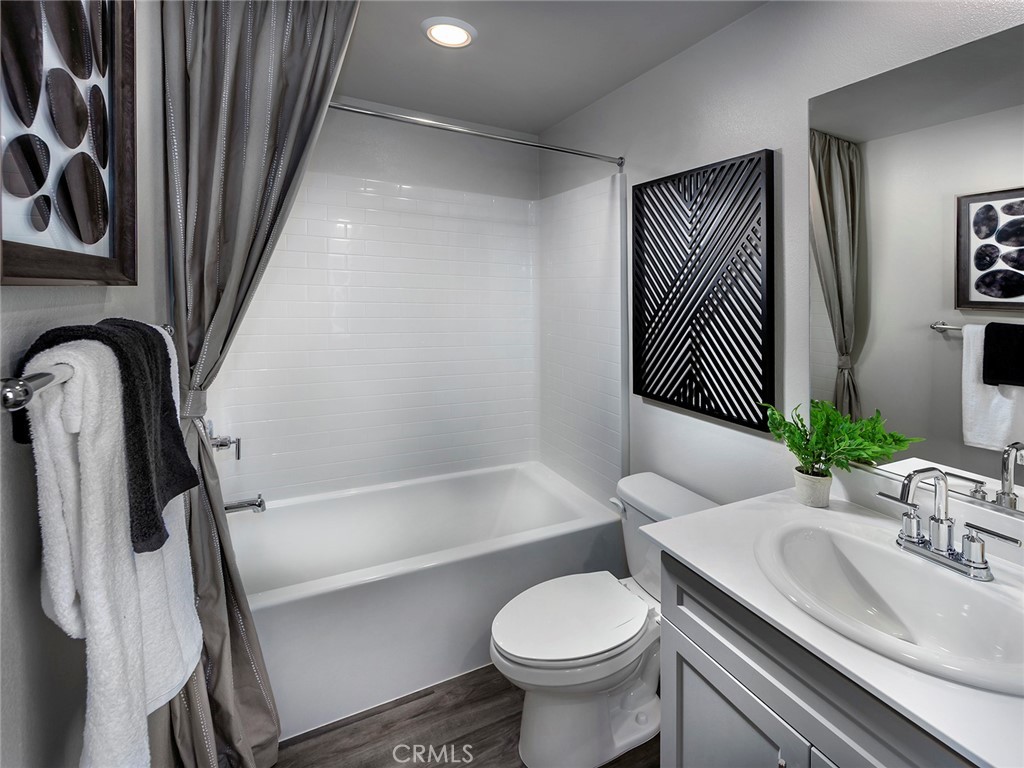 4723 Merida Way Oceanside, CA 92057 - Photo 9 of 13 Photo is not of the actual home, but is an inspirational photo of builder’s model home and may depict options, furnishings, and/or decorator features that are not included